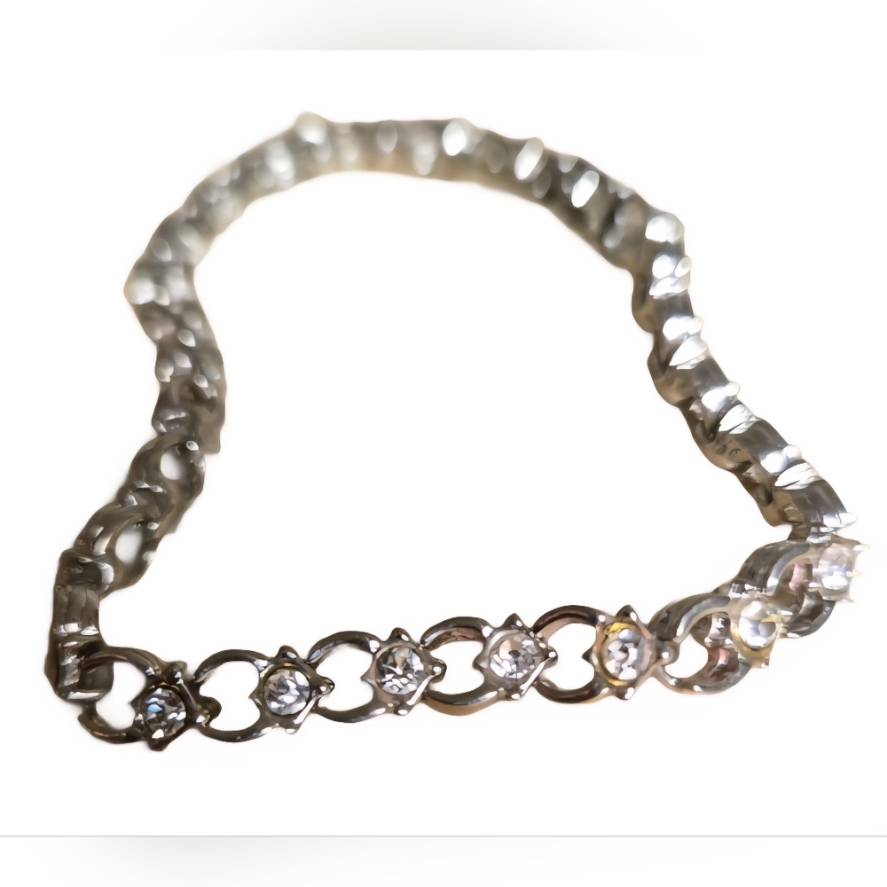 vintage tennis bracelet with crystals and fold over clasp